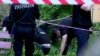 Сотрудники украинской полиции на месте покушения на журналиста из Казахстана Айдоса Садыкова. Киев, 18 июня 2024 года