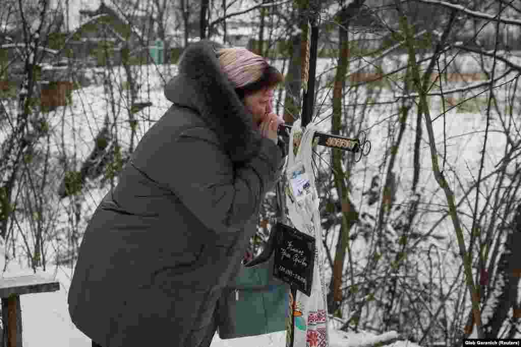 "For me the world ended on March 5 (believed to be the day of Filkina's death)," Safonova said as she sobbed next to her sister's grave. "It is one thing when someone dies after a long illness and is buried. It is another if someone is killed unexpectedly and for no reason." 
