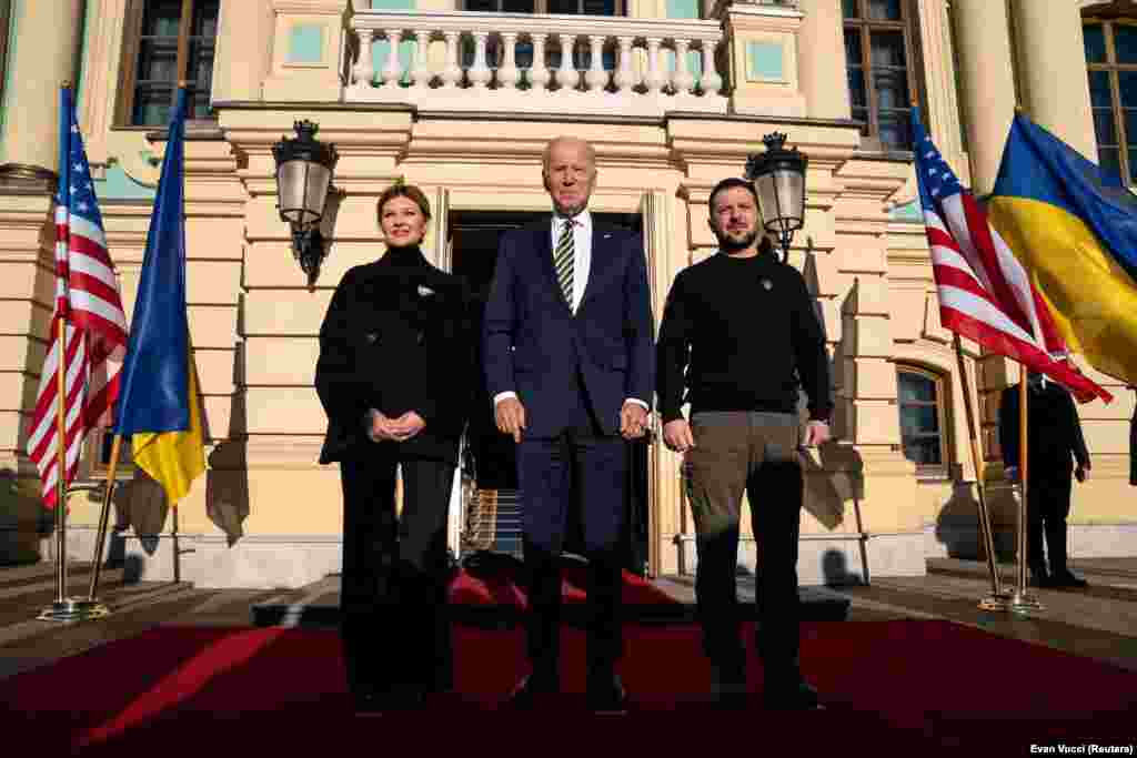 Biden (center) poses with Zelenskiy (right) and Olena Zelenska at Mariynskiy Palace during his nannounced visit to Kyiv on February 20. The visit took place several days ahead of the first anniversary of Russia's brutal invasion of the country.