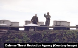 Workers at a nuclear weapons facility in Ukraine in the 1990s