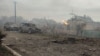 The aftermath of a deadly Russian missile strike on the Ukrainian village of Zarichne on November 3. 