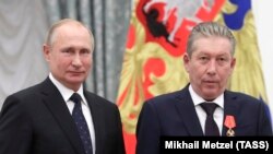 Президент Владимир Путин и председатель совета директоров "Лукойла" Равиль Маганов