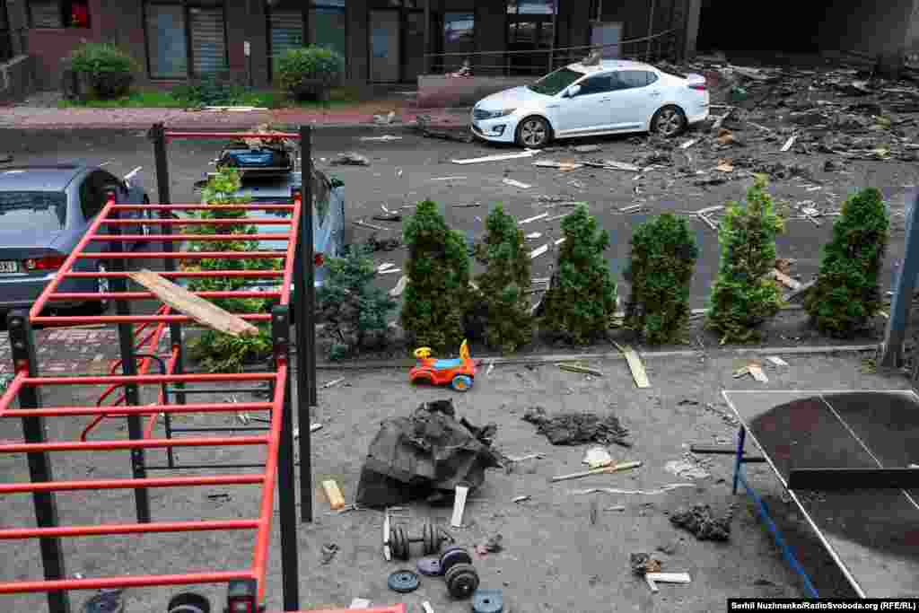 Scattered wreckage after the drone strike on the Shevchenkivskiy district.Kyiv authorities say one person was killed and two injured in the July 21 strikes. Ukraine's Kharkiv and Ivano-Frankiivsk regions were also hit.