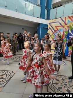 Children perform at the opening of the military-patriotic club in Minsk.