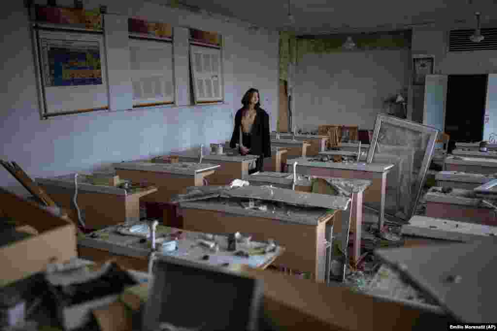 "What happened is a tragedy. I have already cried out about everything I lost. I miss my school, friends, and teachers. But there will be a new school, new teachers, and friends. The most important thing is that life goes on," said Khrystyna Ignatova, 16, as she views her former classroom that was bombed by Russian forces on March 3.