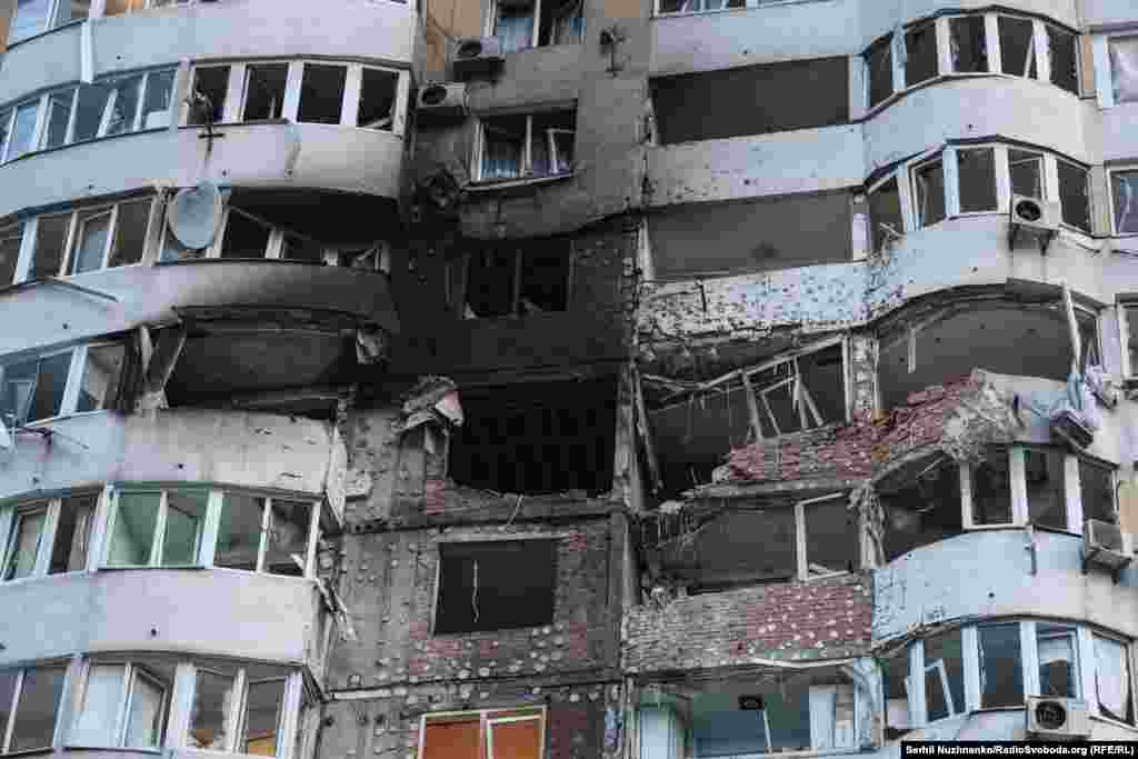 The aftermath of one Russian strike on a residential high-rise building in Kyiv photographed on June 6.