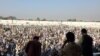 The deadly incident occurred inside a football stadium where thousands had gathered to secure visas from the Pakistani consulate