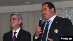 Armenia -- President Serzh Sarkisian (L) and Prosperous Armenia Party leader Gagik Tsarukian.