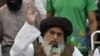 Khadim Hussain Rizvi speaks to supporters during a protest following the Supreme Court's decision to acquit Pakistani Christian woman Asia Bibi of blasphemy, in Lahore on November 2.