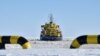 Despite A Mass COVID-19 Outbreak, Workers In Russia's Arctic Labor On 