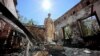 Пошкоджений пам’ятник українському філософу Григорію Сковороді внаслідок російського ракетного удару по Національному музею Григорія Сковороди в селі Сковородинівка на Харківщині, 7 травня 2022 року
