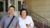 Оппозиционный политик Марат Жанузаков и его адвокат Елена Савинова. Алматы, 26 июня 2014 года. 