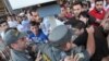 Столкновения между сотрудниками полиции и молодыми людьми, протестующими против подорожания проезда в транспорте, Ереван, 22 июля 2013 г. 