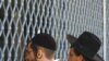 Israel -- Two Jewish youths look inside the Merkaz Harav Yeshiva in Jerusalem, 07Mar2008