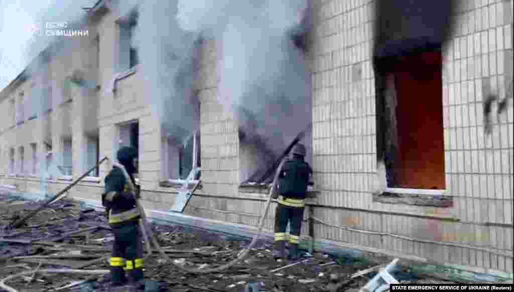 Firefighters working on March 19 after a strike on a hospital in Krasnopillia, in Ukraine's Sumy Region.Since the March 18 phone call, a raft of sites have been struck throughout Ukraine and Russia.
