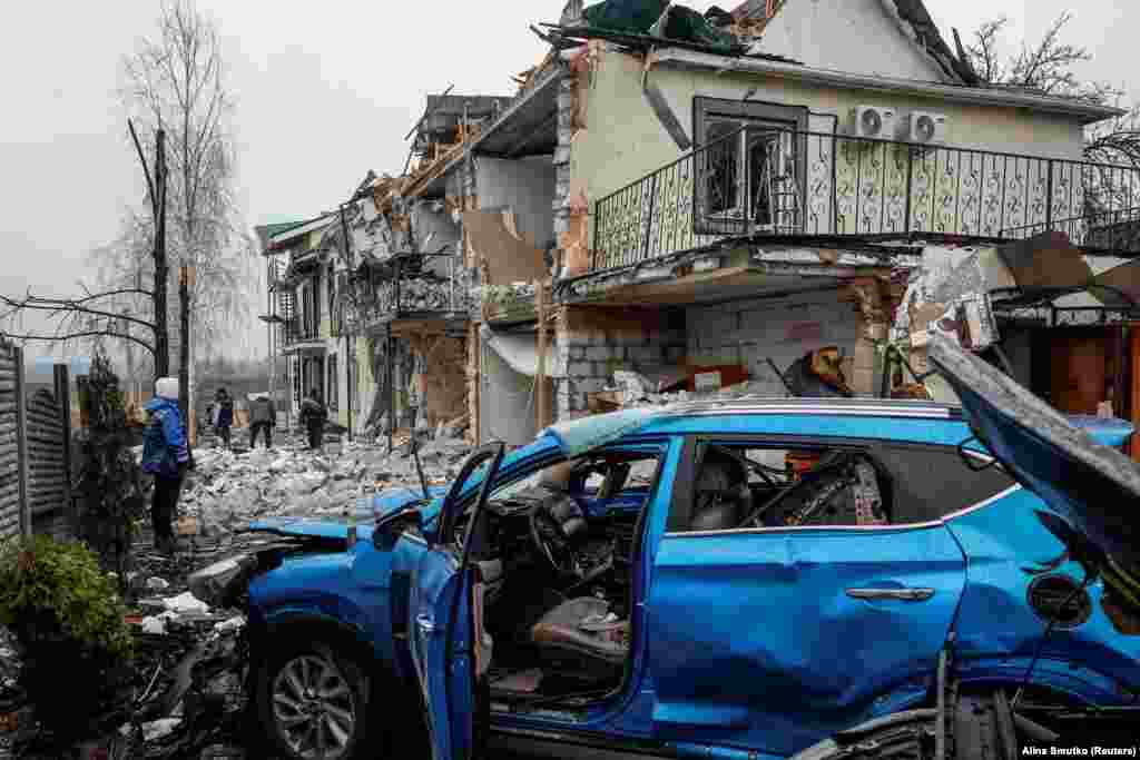 A residential street in Hostomel, near Kyiv, photographed on March 19 after an overnight drone strike.A partial cease-fire was announced on March 18 in which the Kremlin vowed to halt attacks on "energy and infrastructure” targets after a phone call between US President Donald Trump and Russian President Vladimir Putin.