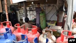 ارشیف: په افغانستان کې د اوبلن ګاز یو پلورنځی