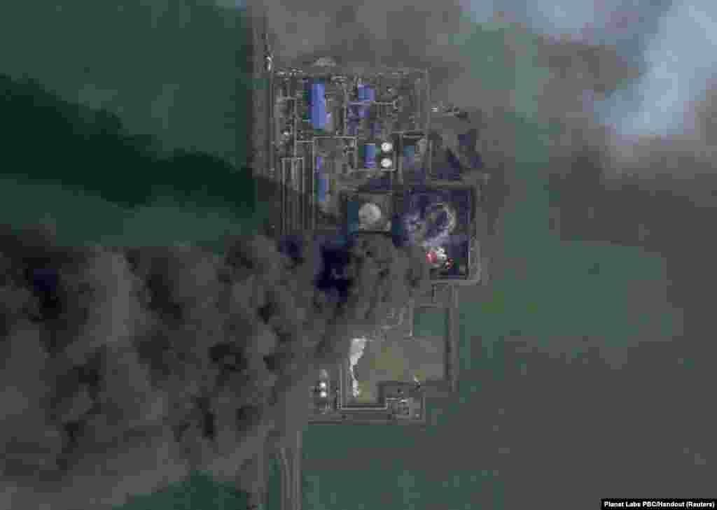 The Kavkazskaya oil depot, in Russia's Krasnodar region, burns after it was attacked by drones on March 19. The Russian authorities pinned the attack on Ukraine.As of March 24 the depot was reportedly still ablaze.