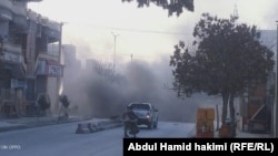 A Kabul police spokesman said a magnetic "sticky" bomb attached to an armored vehicle killed two people, and wounded two others.