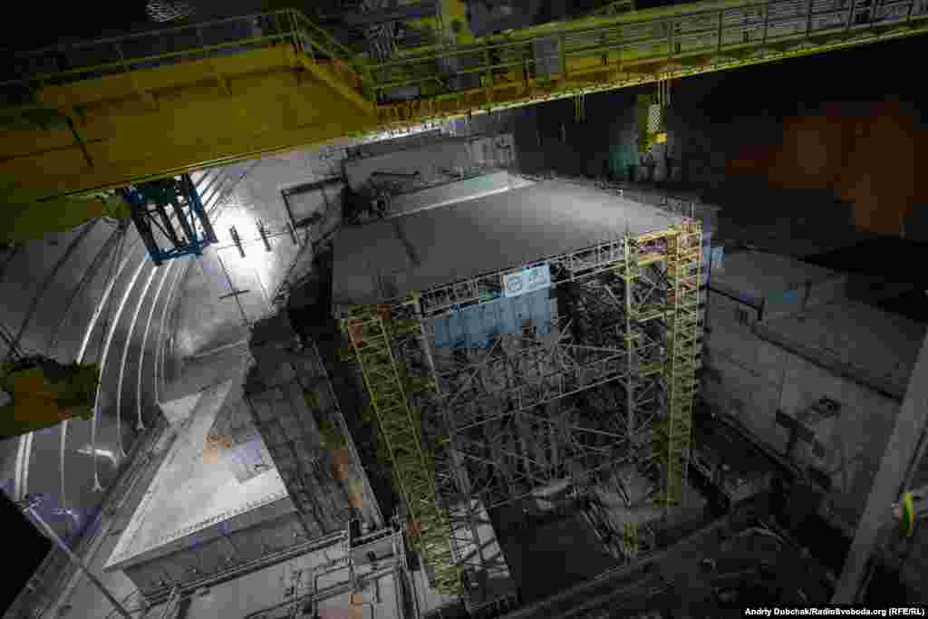 A new steel structure was built under the containment shield to support the decaying concrete sarcophagus in Chernobyl's reactor number four. Eventually, officials plan to dismantle the sarcophagus and remove the remaining nuclear fuel from the plant. 