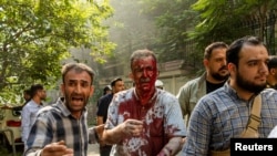 خبرداری: انځور کې ټپي شوی کس