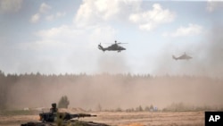 Lithuanian and German troops during an exercise Pabrade training ground