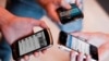  Iranian authorities have reportedly been pressuring citizens by blocking their SIM cards if they criticize the government on social media. (file photo)