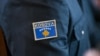 Flamuri i Kosovës në një uniformë ushtarake.