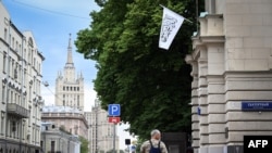 The flag of the Islamic Emirate of Afghanistan flies from the Afghan embassy in Moscow on July 4, 2025.