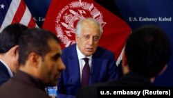 U.S. special envoy for peace in Afghanistan Zalmay Khalilzad talks with local reporters at the U.S. Embassy in Kabul on November 18.