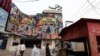 Pakistani moviegoers visit Zila Ghaziabad an Indian movie starring Bollywood star Sanjay Dutt at a cinema in Lahore.