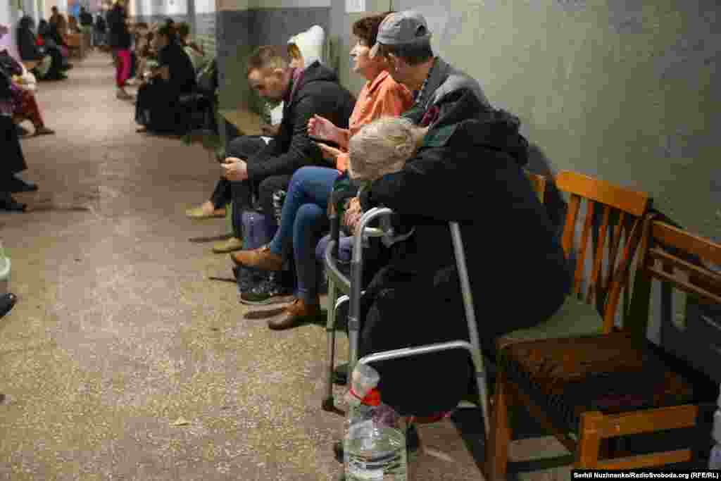 Residents wait in a bomb shelter during the attacks.