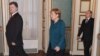 Президент України Петро Порошенко, канцлер Німеччини Ангела Меркель та президент Росії Володимир Путін під час зустрічі у «нормандському форматі» у Мілані. Жовтень 2014 року