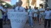 O întrebare a moldovenilor la protestul împotriva scumpirii curentului electric, Chișinău, 22 iulie 2015
