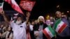 Pro-government demonstrators in Tehran celebrate Iran’s June 13 air strike on Israel. While such scenes are genuine, RFE/RL has found that Iranian state media has also circulated unrelated or outdated visuals to support its narrative of the conflict.