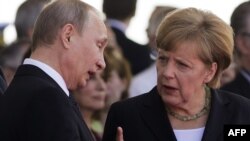 Володимир Путін та Ангела Меркель 