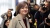Moldovan President Maia Sandu reacts after casting her ballots in Chisinau during the country's presidential election and referendum on joining the European Union on October 20.