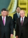 Ruski predsjednik Vladimir Putin (u centru desno) dočekuje svog kineskog kolegu, Xi Jinpinga (u centru lijevo), na razgovorima u Kremlju u junu.