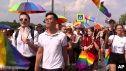 Rights groups say Hungary is “legislating fear” with a new ban on LGBTQ expression. Protesters say they won’t be sidelined.