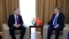 Tajik Foreign Minister Sirodjidin Aslov (left) met his Kyrgyz counterpart, Erlan Abdyldaev, in Cholpon-Ata on July 21.