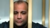 The pardon for Sergei Khadzhikurbanov, convicted of involvement in Anna Politkovskaya's killing, was "a monstrous instance of injustice and lawlessness," the late journalist's children and the staff of Novaya gazeta said. (file photo)