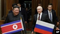 Russian President Vladimir Putin, right, and North Korea's leader Kim Jong Un during their meeting in June. 