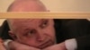 Оппозиционный политик Владимир Козлов на скамье подсудимых. Актау, 8 октября 2012 года. 