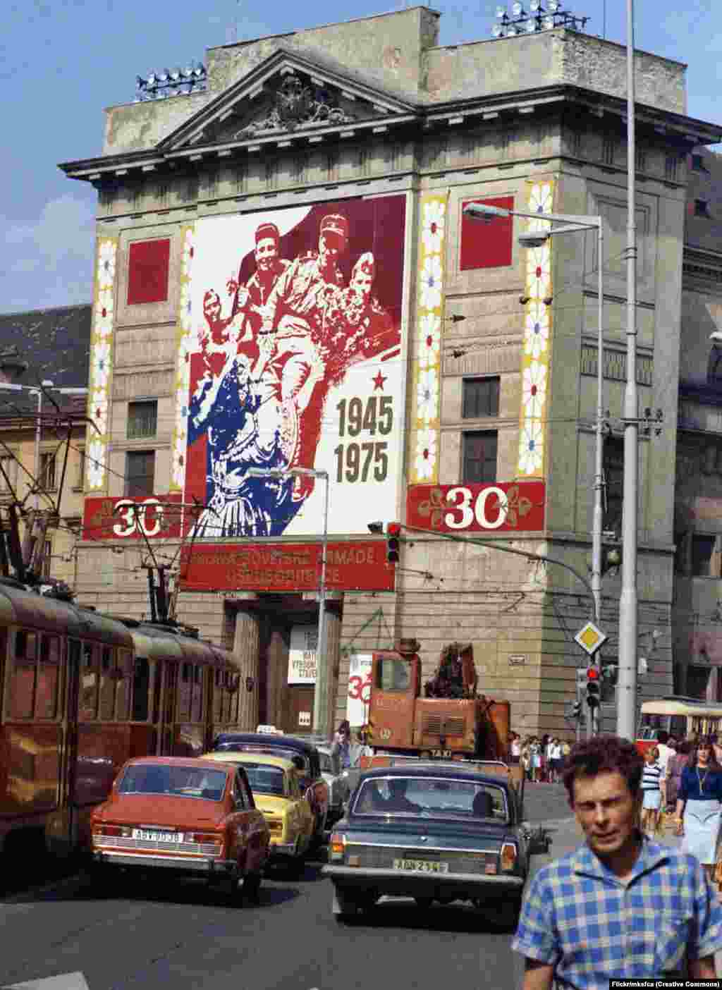 A 1975 photo shows a banner on the Hybernia Theater commemorating 30 years since the entry of Soviet troops into Prague during World War II. 